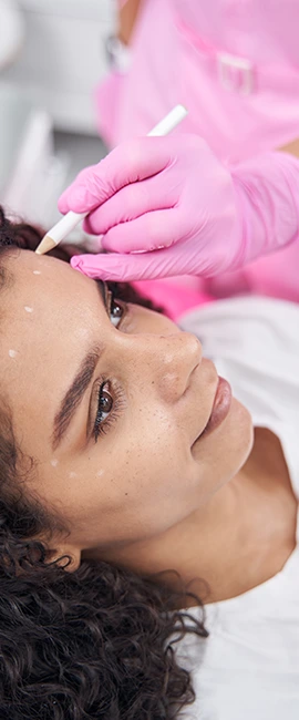 Image of a client receiving treatment from a SBR employee.